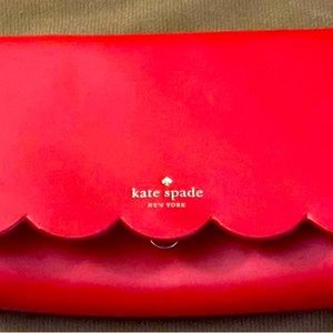 NWOT! Red Kate Spade crossbody, tan interior. Mint condition. Retail $159+